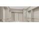 Spacious walk-in closet with ample storage and shelving units at 9225 Dalmahoy Pl, Las Vegas, NV 89145