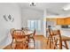 Inviting dining area with wood floors and a table perfect for Gathering meals at 930 High Plains Dr, Henderson, NV 89002