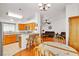 Open floor plan with a seamless transition from kitchen to dining and living areas at 930 High Plains Dr, Henderson, NV 89002