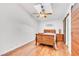 Main bedroom with decorative sliding doors and ceiling fan at 930 High Plains Dr, Henderson, NV 89002