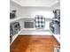 Walk-in pantry with wood flooring and ample shelving space for storage at 930 High Plains Dr, Henderson, NV 89002
