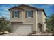 Charming two-story home featuring a two-car garage and neutral color palette at 9918 Landings St, Las Vegas, NV 89141