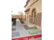 Home exterior featuring stucco walls and manicured landscaping, with a private entrance at 10231 Delray Beach Ave # 201, Las Vegas, NV 89129