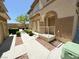 Well-maintained home exterior featuring stucco walls, manicured landscaping, and a private entrance at 10231 Delray Beach Ave # 201, Las Vegas, NV 89129