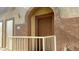 Elegant home entrance with an arched doorway and decorative stucco accents, creating a welcoming first impression at 10231 Delray Beach Ave # 201, Las Vegas, NV 89129