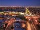 Nighttime aerial view showcasing the city lights and neighborhood layout at 10243 Aragon Crown Rd, Las Vegas, NV 89135