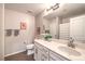 Bathroom featuring double sinks, large vanity and ample storage at 10243 Aragon Crown Rd, Las Vegas, NV 89135