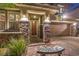 Inviting front porch with stone accents and a cozy bench, leading to a well-maintained entrance at 10243 Aragon Crown Rd, Las Vegas, NV 89135