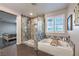 This luxurious main bathroom features a soaking tub and elegant stone shower at 10243 Aragon Crown Rd, Las Vegas, NV 89135