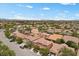 Community aerial view showcasing neighborhood homes with well-manicured landscaping at 10300 S Dapple Gray Rd, Las Vegas, NV 89178