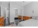 Bedroom featuring mirrored closet doors and ample natural light at 10300 S Dapple Gray Rd, Las Vegas, NV 89178