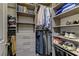Custom walk-in closet with plenty of shelving and storage options for shoes and clothing at 10360 Pescado Ln, Las Vegas, NV 89135