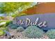 Attractive community sign that reads 'Vista Dulce' surrounded by appealing landscaping at 10360 Pescado Ln, Las Vegas, NV 89135