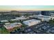 Aerial view of a large commercial shopping center with stores, office buildings, and parking lots at 1064 Calvia St, Las Vegas, NV 89138