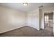This bedroom offers neutral paint, carpet, and closet space at 1064 Calvia St, Las Vegas, NV 89138