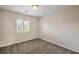 This bedroom offers neutral paint, carpet, and plantation shutters at 1064 Calvia St, Las Vegas, NV 89138