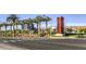 View of the Downtown Summerlin community sign with palm trees and mountain views in the background at 1064 Calvia St, Las Vegas, NV 89138