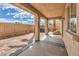 Relaxing covered patio with brick flooring and outdoor space with columns, and a hot tub at 1064 Calvia St, Las Vegas, NV 89138