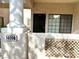 Inviting front entryway with security door and a welcoming column, leading into a cozy residence at 1409 Santa Margarita St # B, Las Vegas, NV 89146