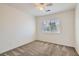 Clean bedroom with neutral walls, ceiling fan, and plush carpet at 1547 Balsam Mist Ave, Las Vegas, NV 89183