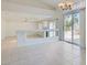 Open dining space features tile floors, a modern chandelier, and a seamless transition to the living area at 1547 Balsam Mist Ave, Las Vegas, NV 89183