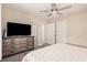 Main bedroom featuring ensuite bathroom, hallway access, and closet at 1832 Merze Ave, Henderson, NV 89011