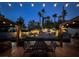 Well-appointed backyard with desert landscaping, pavers, outdoor lights and a seating area at 2102 Rhonda Ter, Henderson, NV 89074