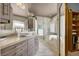 Bathroom with a sleek vanity, glass shower and soaking tub at 2102 Rhonda Ter, Henderson, NV 89074