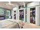 Bedroom with walk-in closets, fireplace and ceiling fan at 2102 Rhonda Ter, Henderson, NV 89074