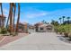 Charming single-story home features a well-manicured yard, desert landscaping, and a spacious driveway at 2102 Rhonda Ter, Henderson, NV 89074