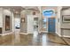 Inviting foyer with high ceilings, stylish decor, and access to multiple rooms in the home at 2102 Rhonda Ter, Henderson, NV 89074