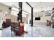 Spacious garage with a car lift, tool chests, and ample storage space at 2102 Rhonda Ter, Henderson, NV 89074