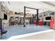 Organized garage featuring a car lift, multiple tool chests, and cabinets at 2102 Rhonda Ter, Henderson, NV 89074