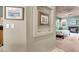 Hallway leading to bedroom featuring a fireplace at 2102 Rhonda Ter, Henderson, NV 89074
