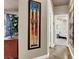Hallway with stylish decor leading to a comfortable bedroom with a ceiling fan at 2102 Rhonda Ter, Henderson, NV 89074