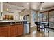 Stylish kitchen boasts stainless steel appliances, dark countertops, and a breakfast bar for casual dining at 2102 Rhonda Ter, Henderson, NV 89074