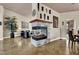 Spacious living area with a fireplace, modern decor, and large windows for ample natural light at 2102 Rhonda Ter, Henderson, NV 89074