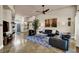 Open-concept living room with a high ceiling, modern decor, and a cozy atmosphere at 2102 Rhonda Ter, Henderson, NV 89074