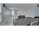 Dining and living area with wood table and views to the front door at 212 Stagecoach Flats, Las Vegas, NV 89031