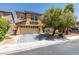 Charming two-story home with a two car garage and manicured front yard landscaping at 212 Stagecoach Flats, Las Vegas, NV 89031