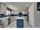 Well-lit kitchen featuring stainless steel appliances, an island, and modern finishes at 212 Stagecoach Flats, Las Vegas, NV 89031