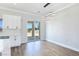 Open concept dining area with sliding glass doors, modern lighting, and ample natural light at 2150 S Manzanita Dr, Pahrump, NV 89048