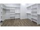 A huge walk-in closet with shelves, drawers, and bars for all your clothing at 2150 S Manzanita Dr, Pahrump, NV 89048