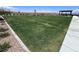 Well maintained green space in a community featuring an overhang structure with tables and chairs at 2194 Pigeon Hawk St, Las Vegas, NV 89138