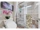 This bathroom showcases a glass shower with a tile surround and convenient built-in shelf at 2509 Big Timber Dr, Las Vegas, NV 89134