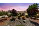 Charming home with drought-resistant landscaping including rock ground cover and desert plants at 2509 Big Timber Dr, Las Vegas, NV 89134