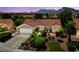 Beautiful home featuring mature desert landscaping, an attached garage and a red tile roof at 2509 Big Timber Dr, Las Vegas, NV 89134