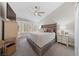 Spacious main bedroom with a ceiling fan and bay window at 2509 Big Timber Dr, Las Vegas, NV 89134