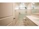 Bright bathroom featuring clean finishes, a glass-enclosed shower, tile floors, and single vanity at 2913 Monate Ct, Henderson, NV 89044