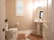 Bathroom with pedestal sink, modern fixtures, and tile flooring at 2913 Monate Ct, Henderson, NV 89044